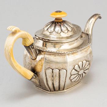 A Russian 19th century parcel-gilt silver tea-pot, St.Petersburg.