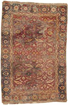 185. MATTO, A MUGHAL RUG, an antique Indian, the second half of the 17th century, ca 191-198,5 x 126,5-127,5 cm.