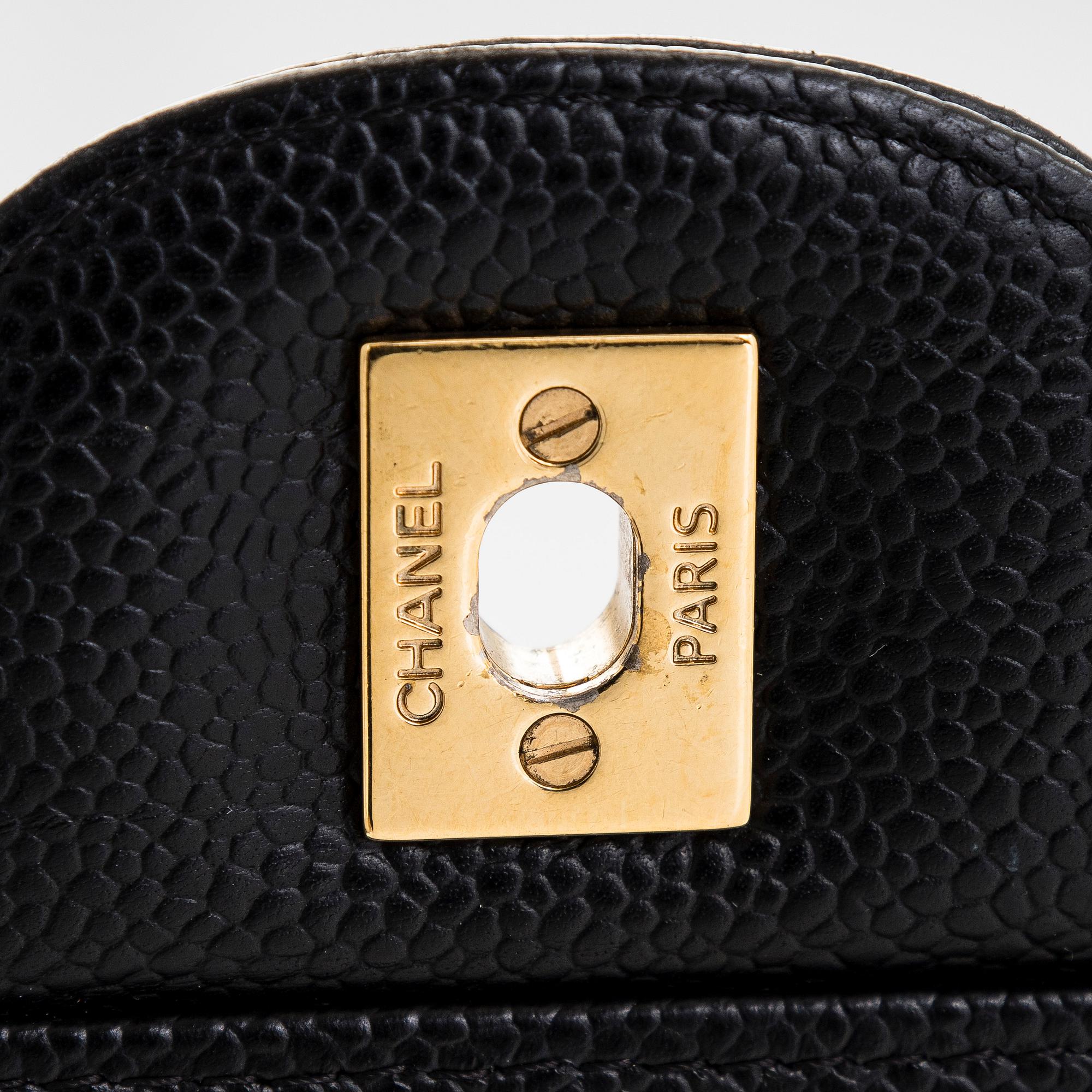 Chanel, a 'Double Flap Bag Maxi' bag, 2013-2014.