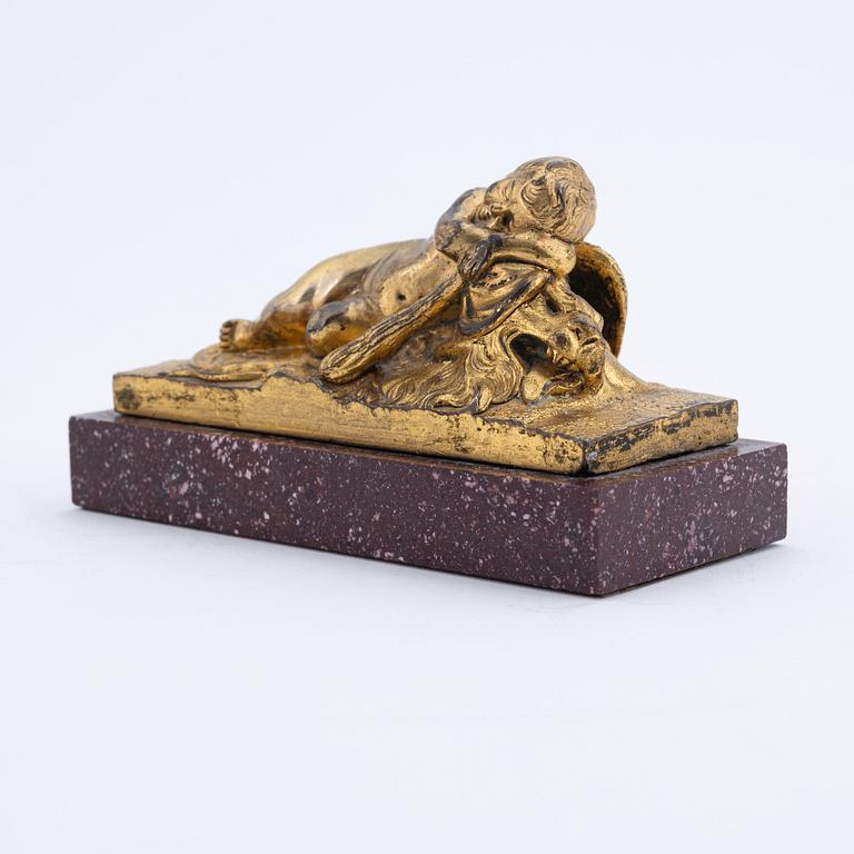 A porphyry and ormolu paperweight, possibly French, late 19th century.