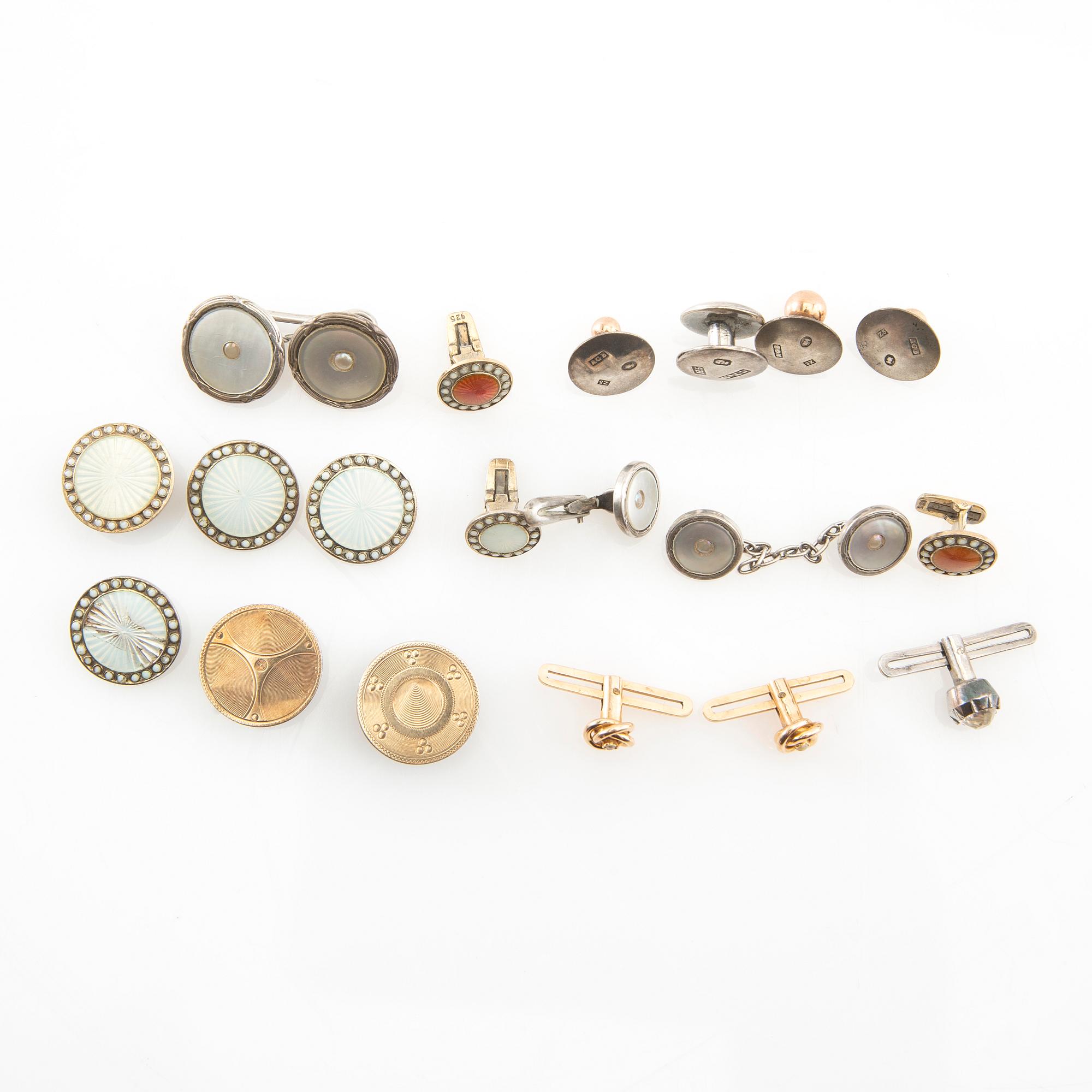 Collection of dress buttons, gold and silver, including those by Axel Georg Björkman, Stockholm 1878.