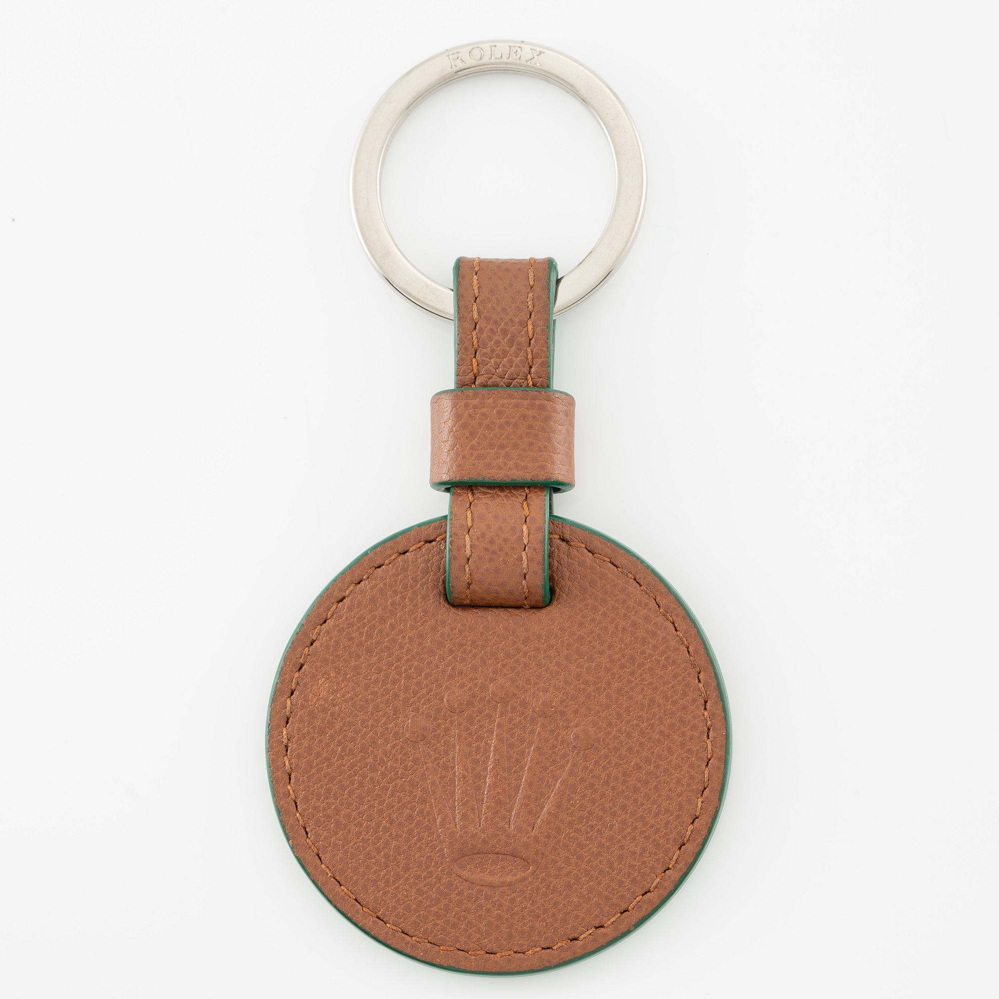 Rolex, key ring, "No Reserve", 59 x 120 mm.