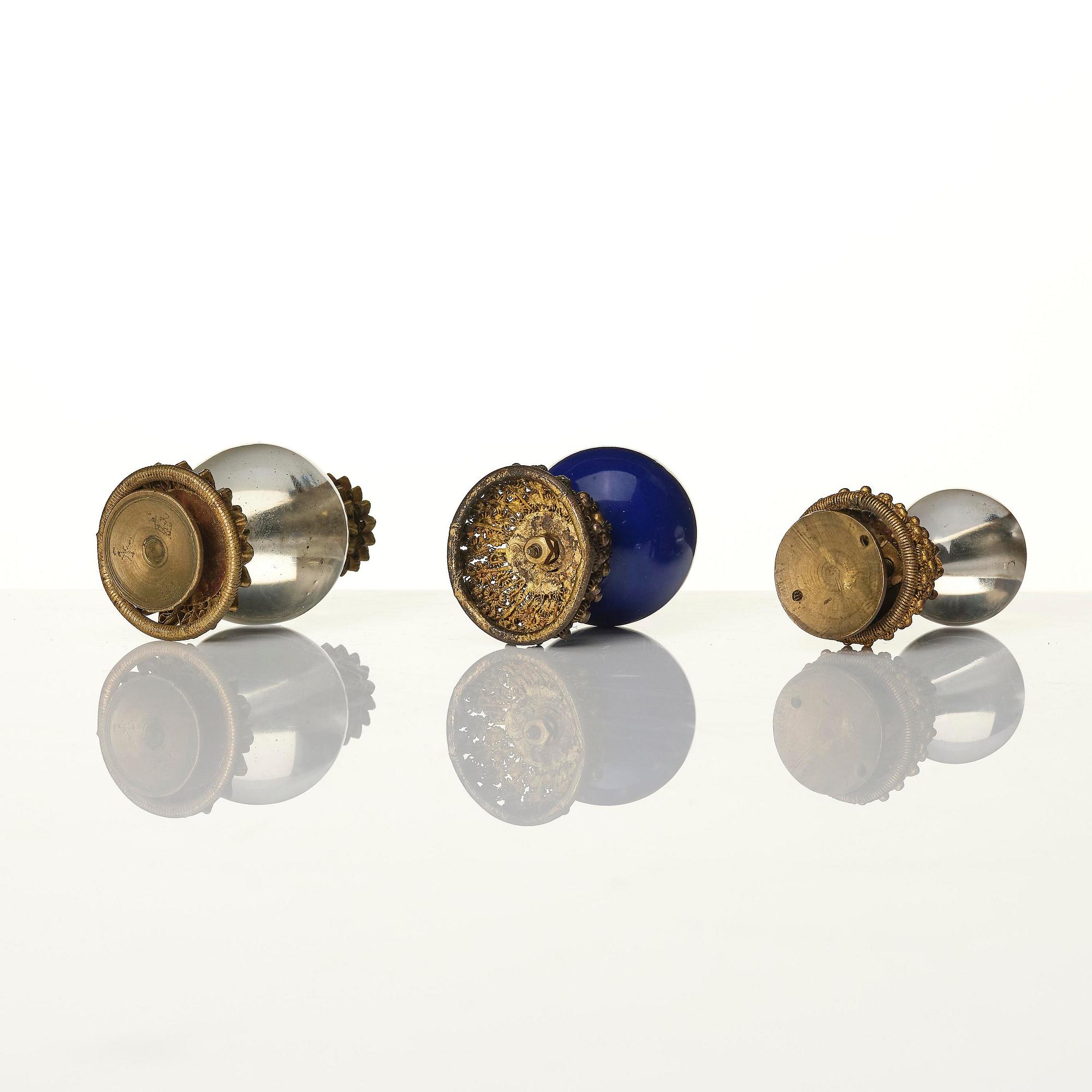 A group of 11 various 'official's hat' finials, Qing dynasty, 19th century.