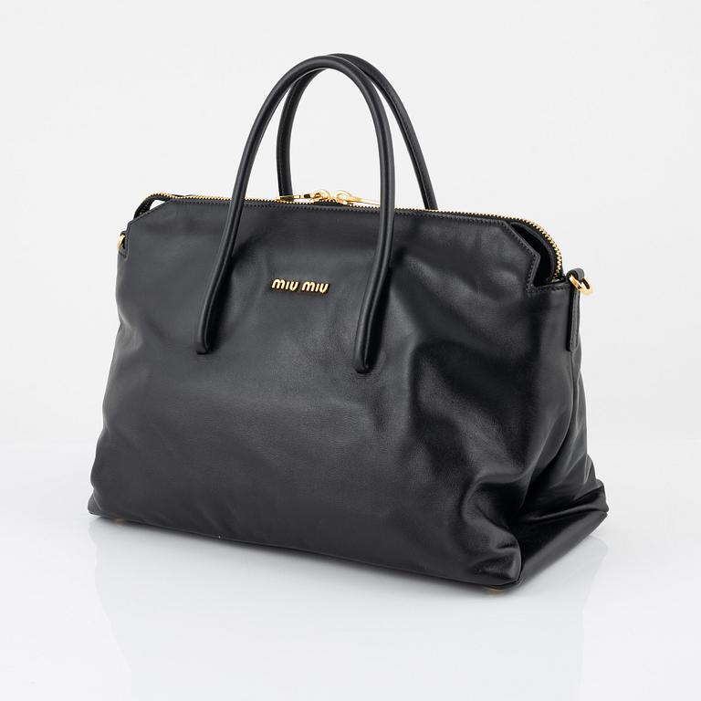 Miu Miu, a black leather handbag.
