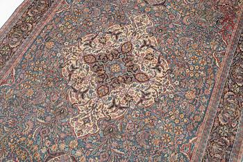 A semi-antique Khorasan rug, east Persia, c. 242 x 140 cm.