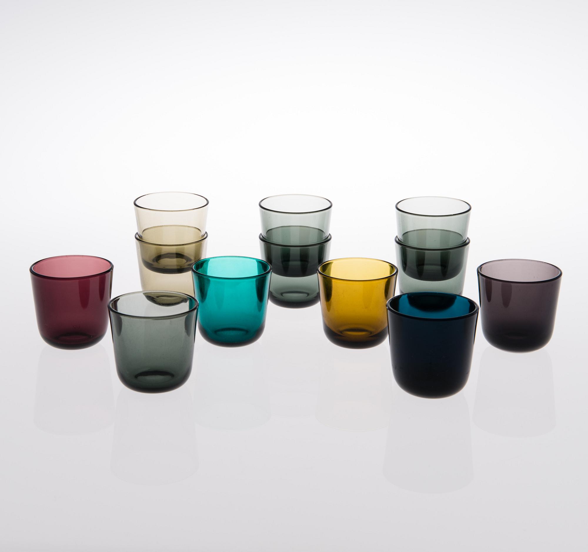 A set of 32 glasses and a pitcher in pressed glass, Nuutajärvi Finland.