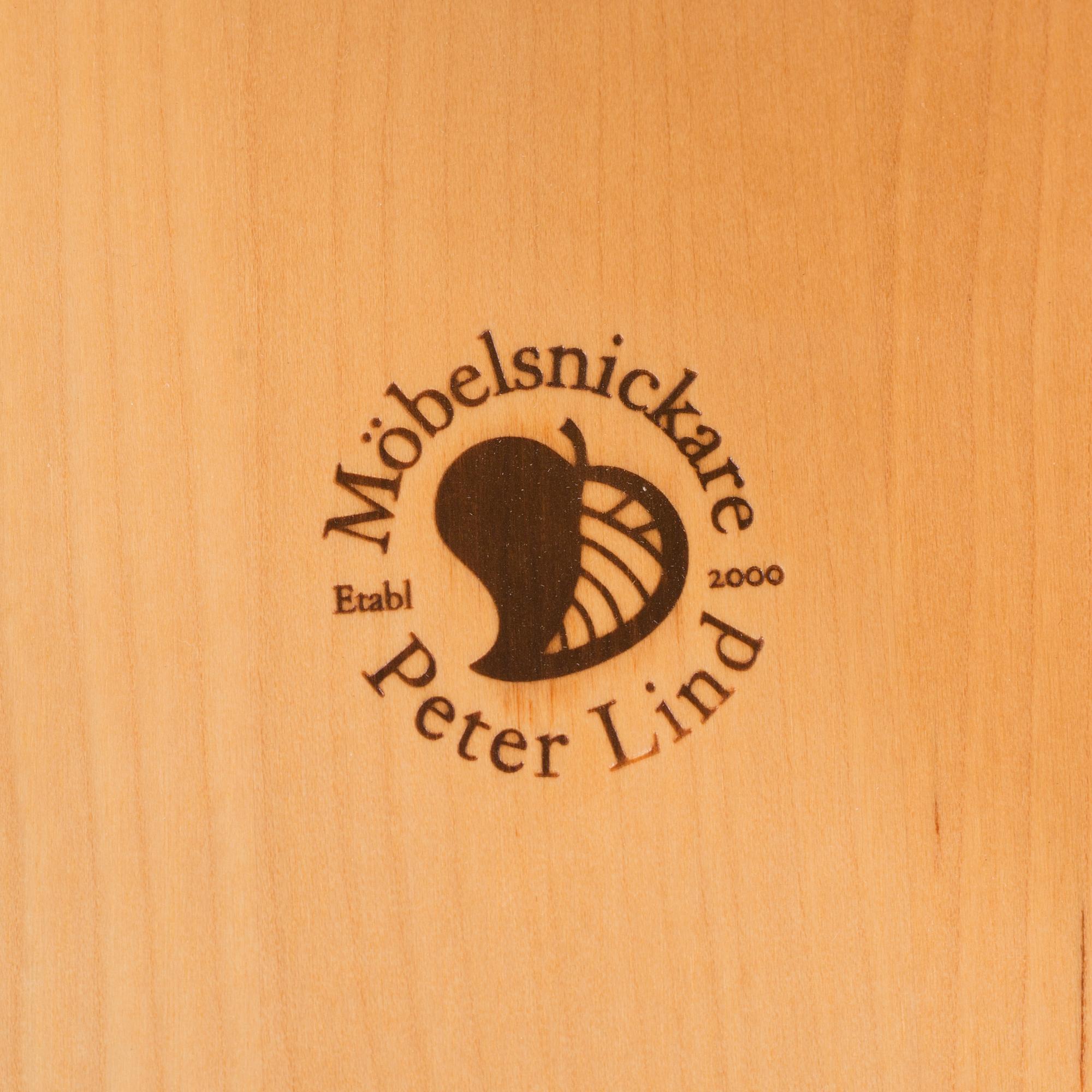 a "plugghästen" chair by Peter Lind.