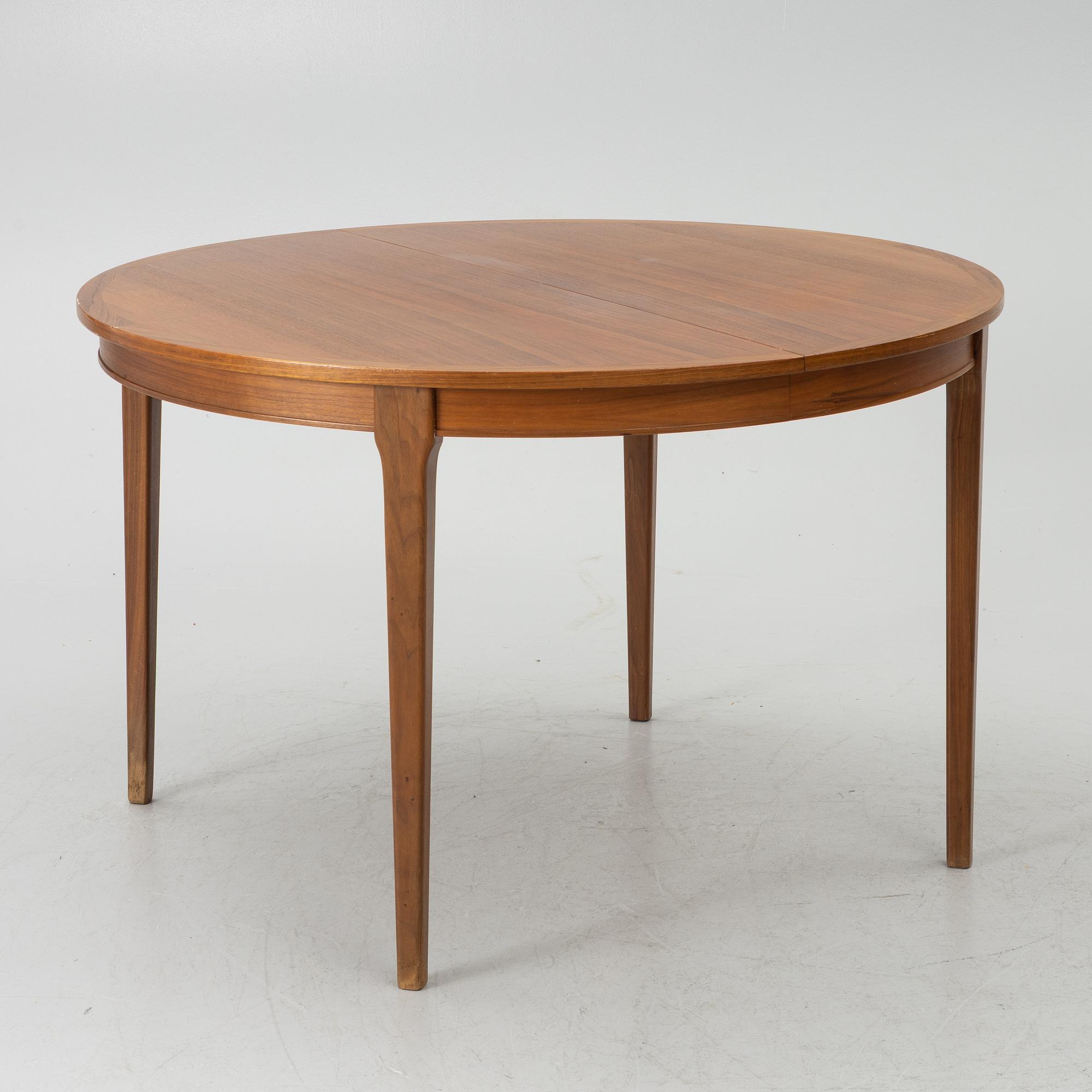 Linde Nilsson, dining table with eight chairs, Lammhult, second half of the 20th century.