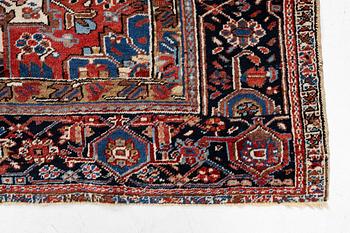 An antique Heriz carpet, west Persia, c. 333 x 238 cm.