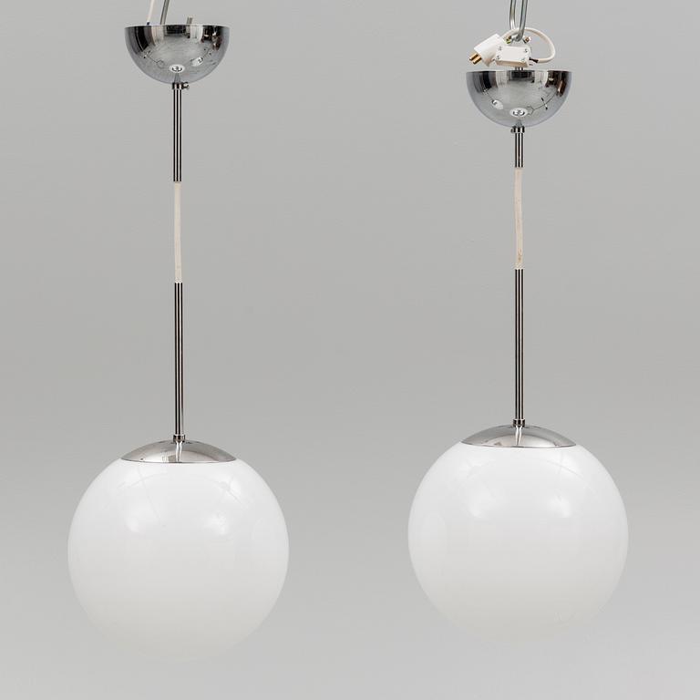 A pair of 'Funkis Globe pendant' ceiling lamps, Konsthantverk.