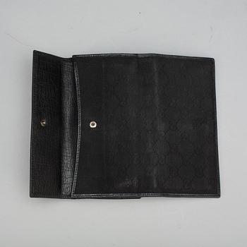 PLÅNBOK, Gucci, 2000-tal.