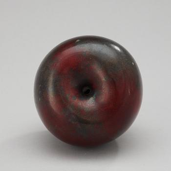 A Hans Hedberg faience apple, Biot, France.