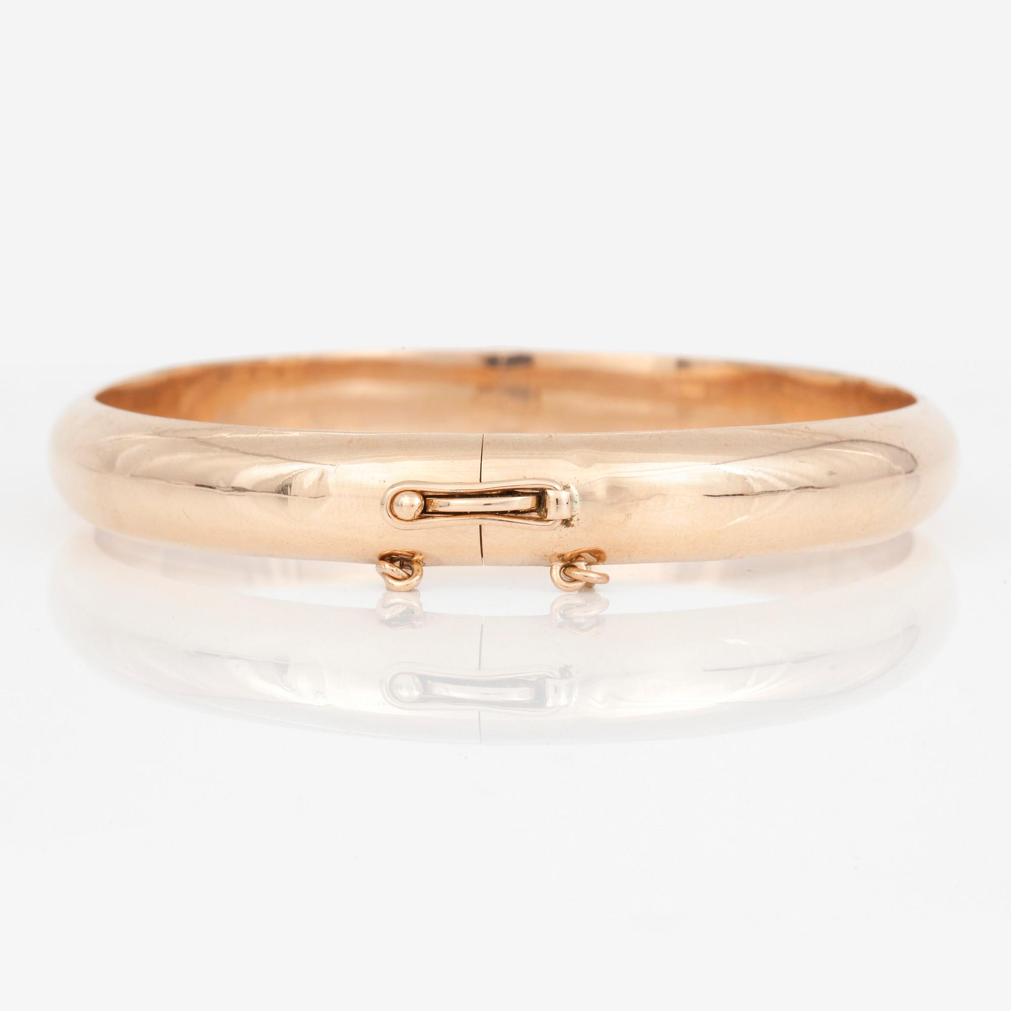 ARMRING, 14K guld.  Finland 1965. Total vikt 14,2 g.