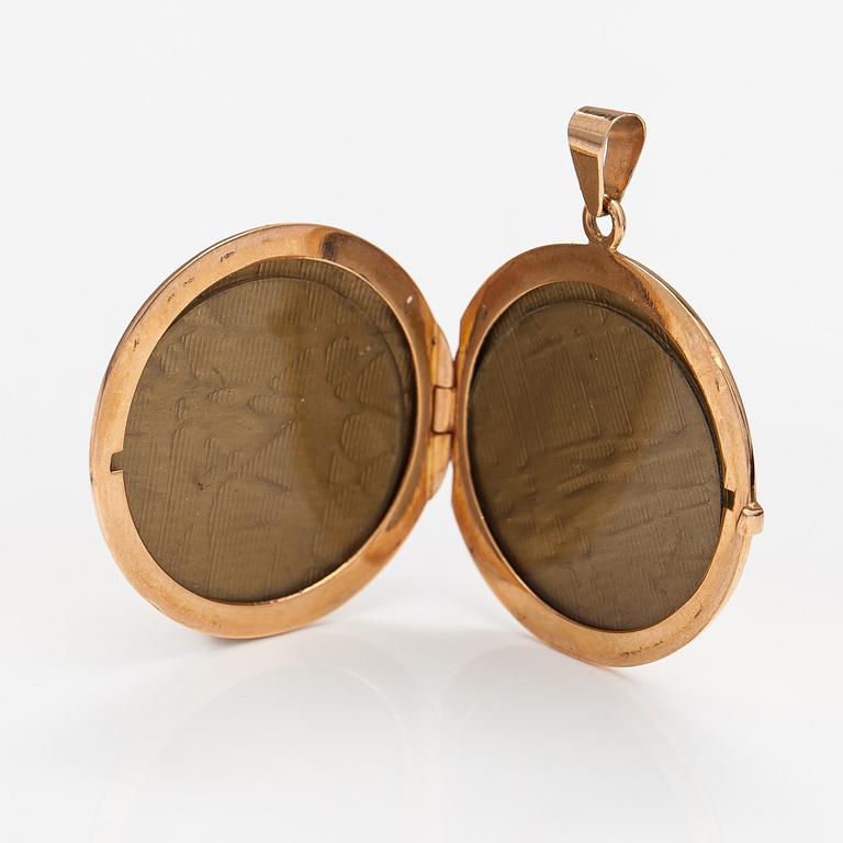 A 14K gold locket. Finnish import marks.