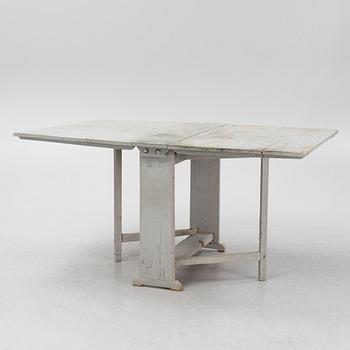 A 19th century gate-leg table.