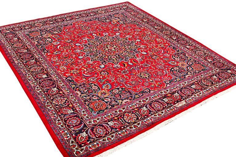 A Najafabad carpet, c. 351 X 305 cm.