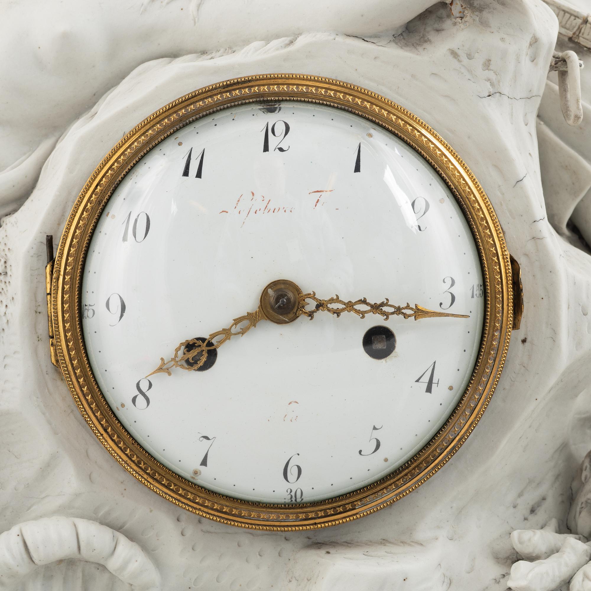 A French Louis XVI bisquit porcelain and ormolu-mounted figural mantel clock, late 18th century.