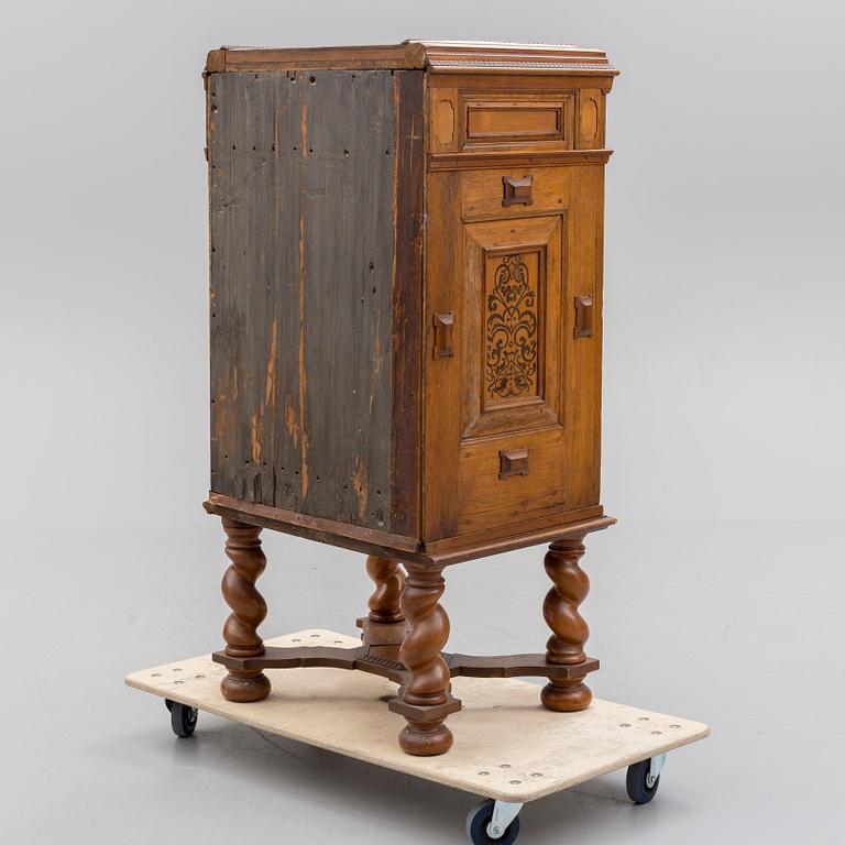 A baroque-style cupboard, 19th century.