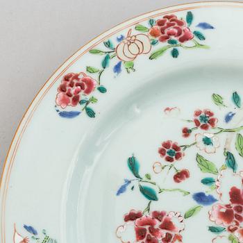 A set of 11 matched famille rose dinner plates, Qing dynasty, Qianlong (1736-95).