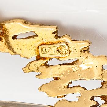 Brosch, 18K guld och diamanter ca 0.09 ct tot.