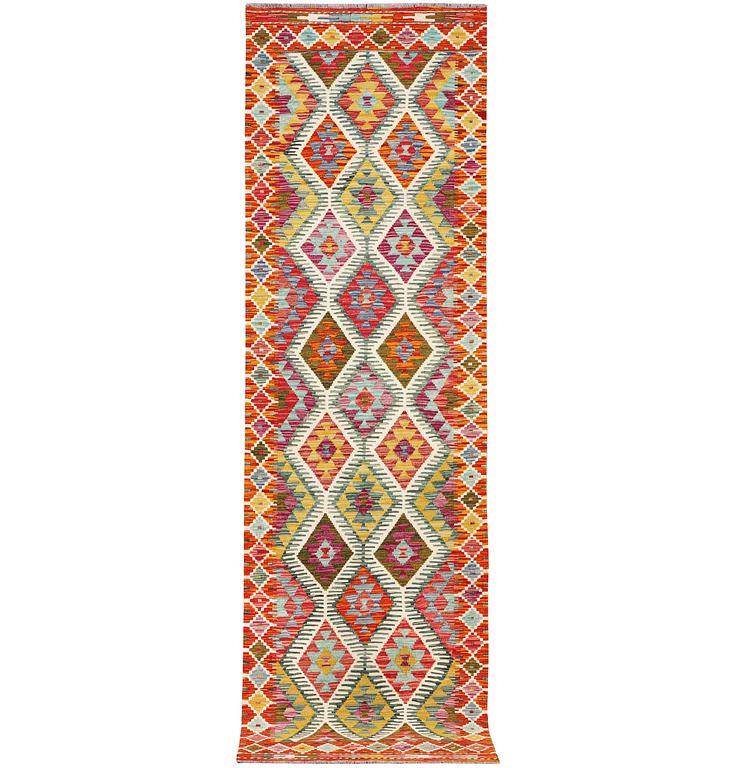 A Kilim runner carpet, c. 291 x 80 cm.