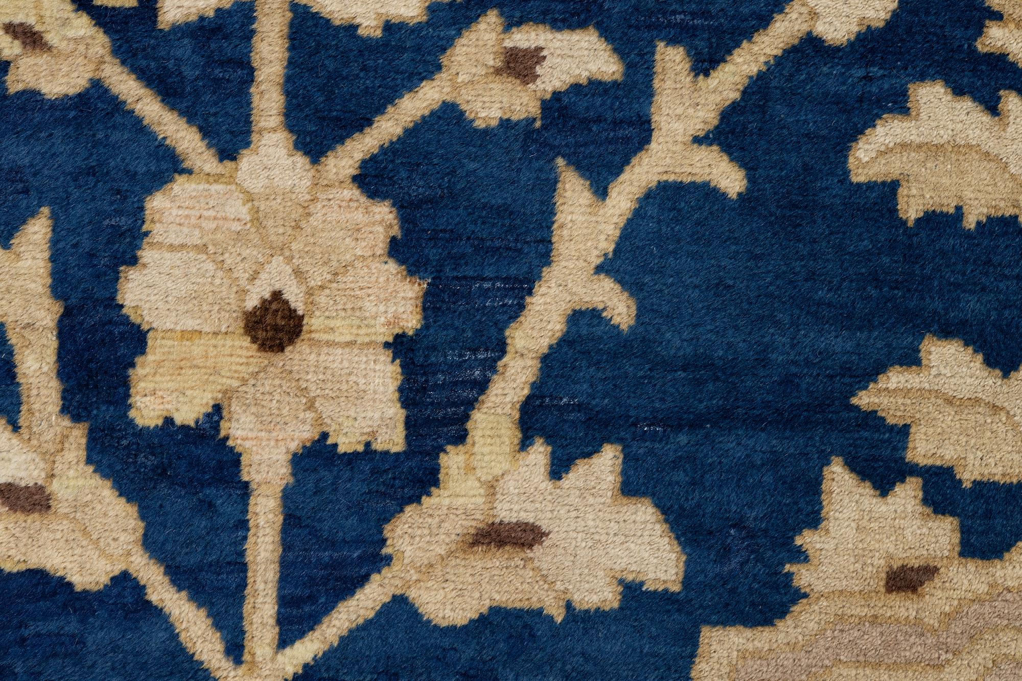 An antique Peking carpet, north China, c. 438 x 373 cm.