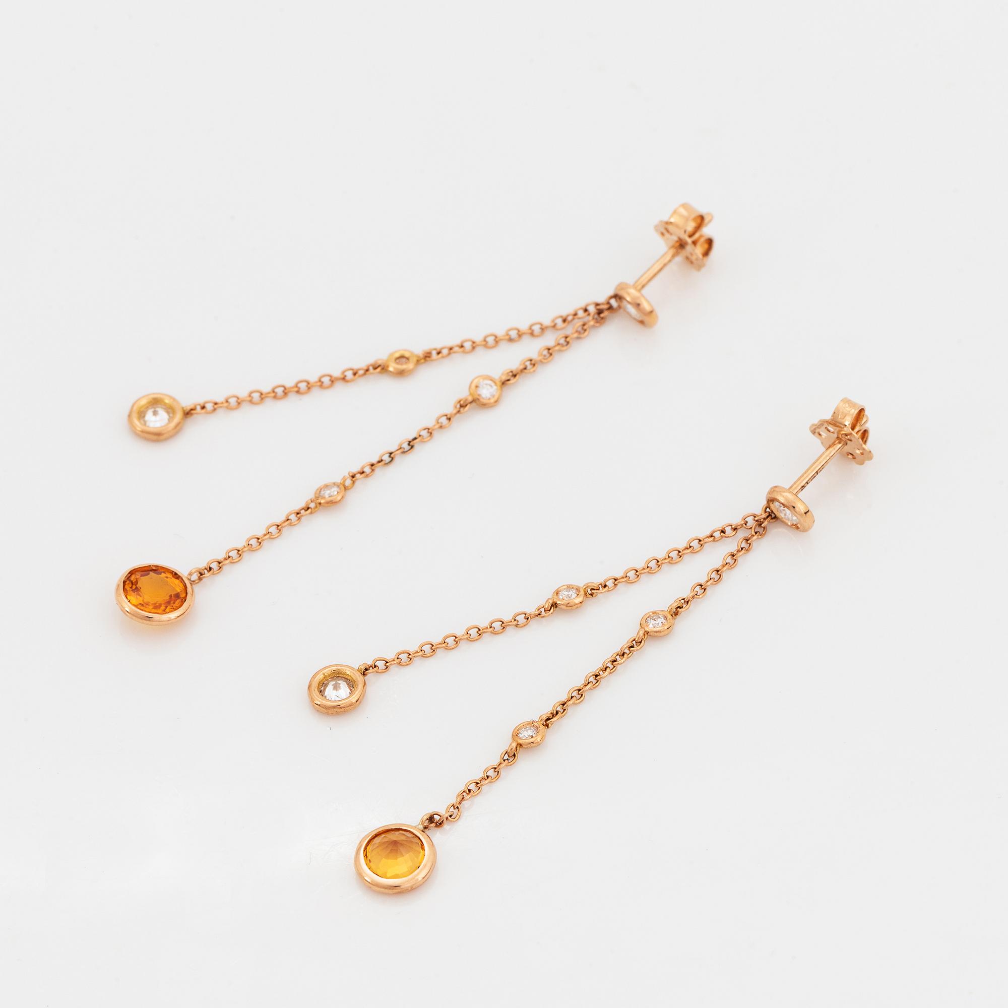 Yellow sapphire and brilliant-cut diamond earrings.