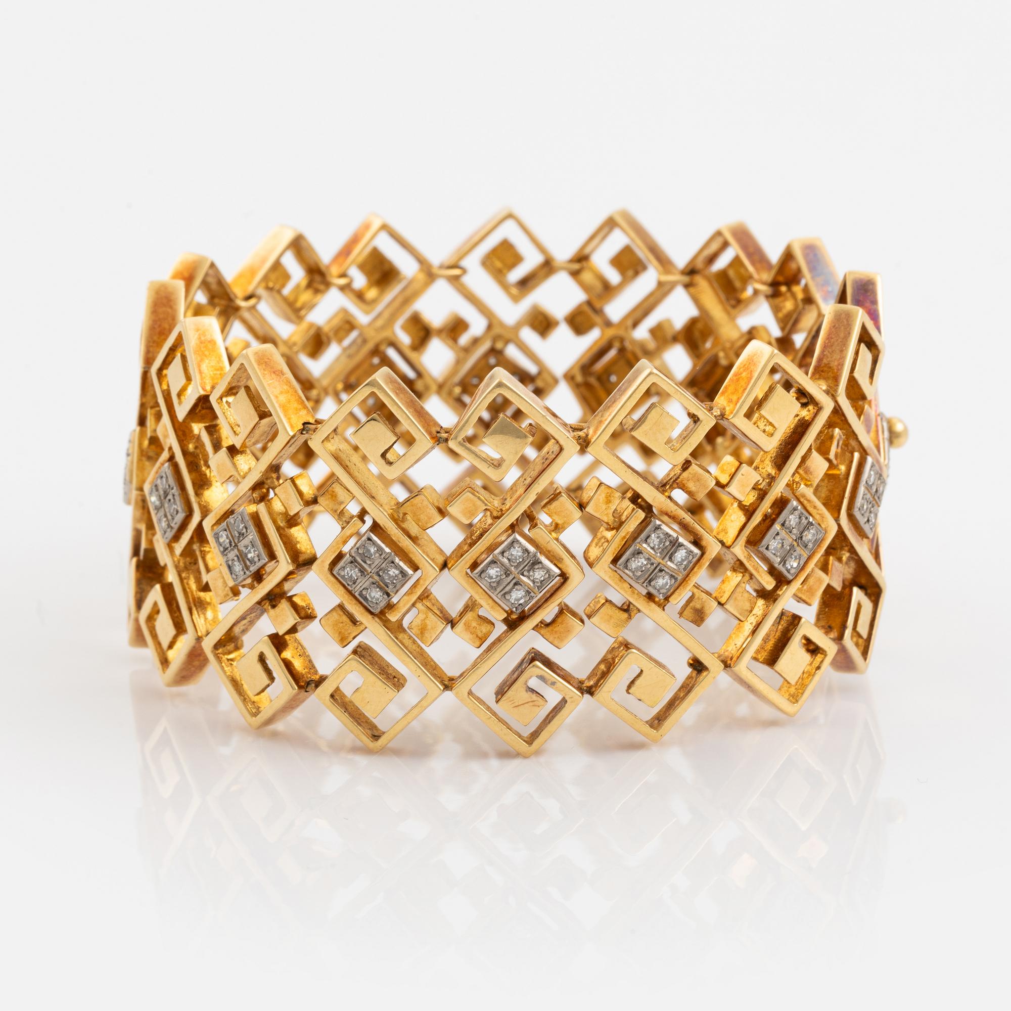 An Ilias Lalounis 18K gold bracelet set with eight-cut diamonds.