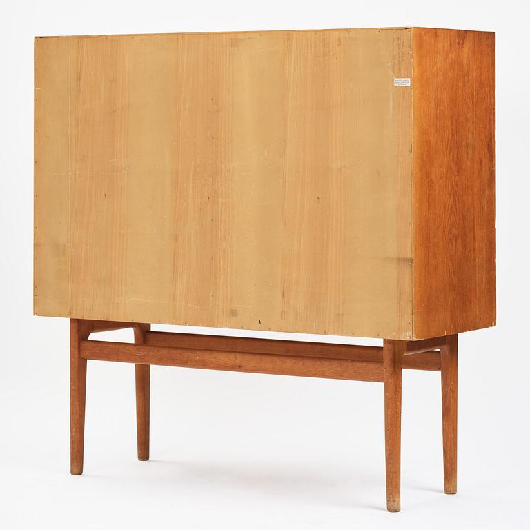 Jørgen Høj, an oak cabinet, Knud Willadsen Møbelsnedkeri, Lillerød, Denmark, 1950s.