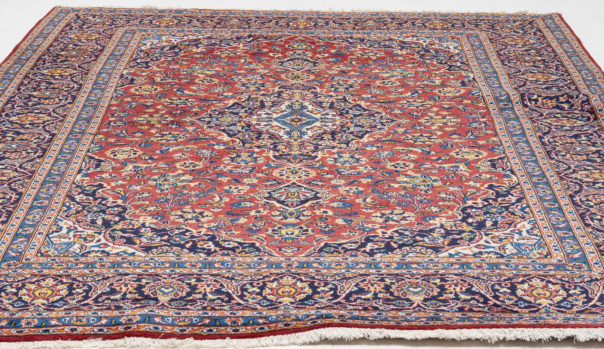 An oriental carpet, c. 340 x 240 cm.