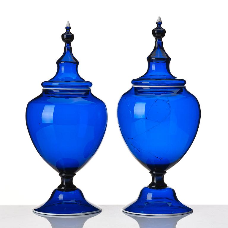 A pair of Swedish blue glass jars with covers, Gothenburg, 18th Century.