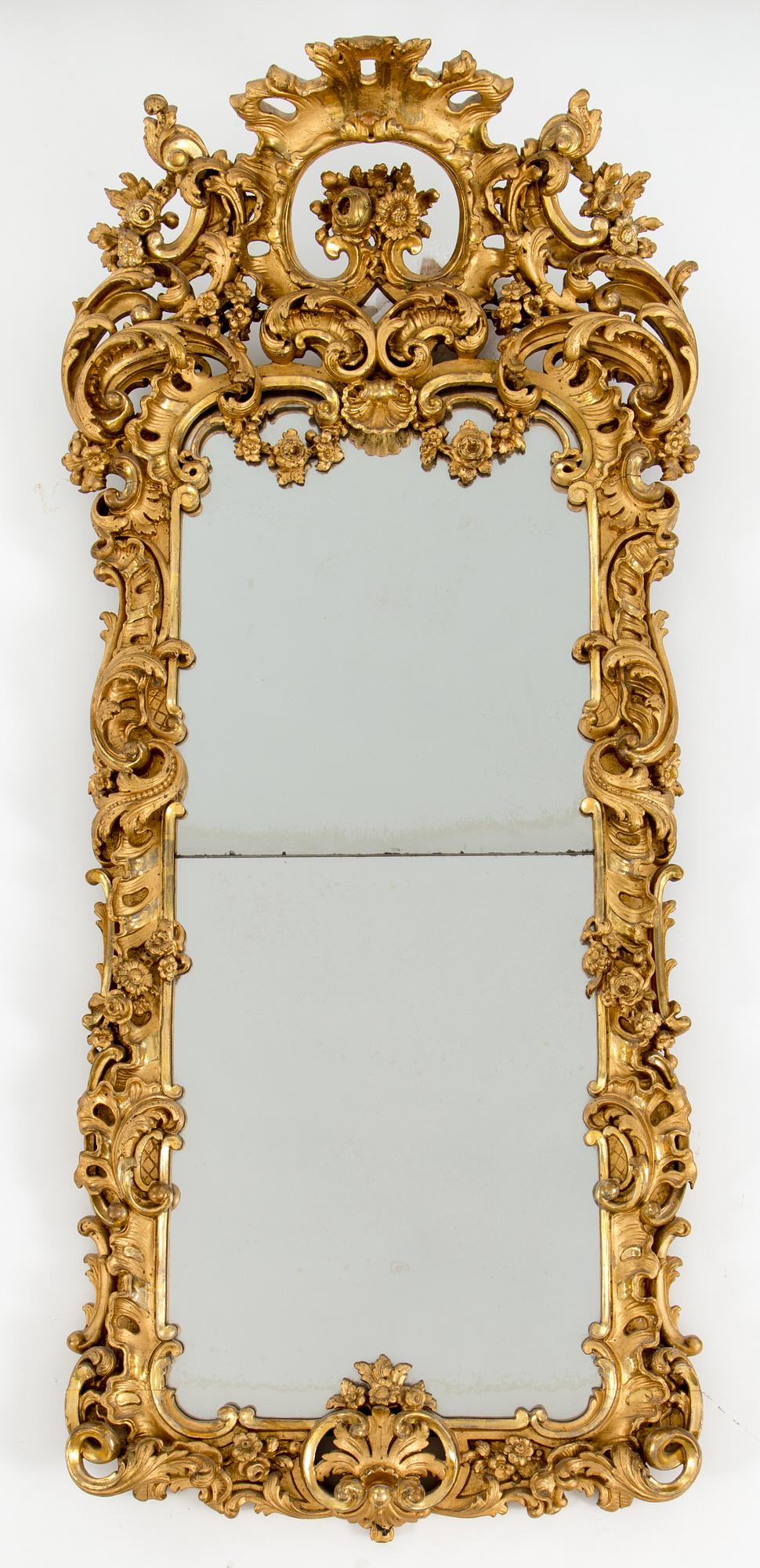 A late 19th century rococo style mirror abd console table.