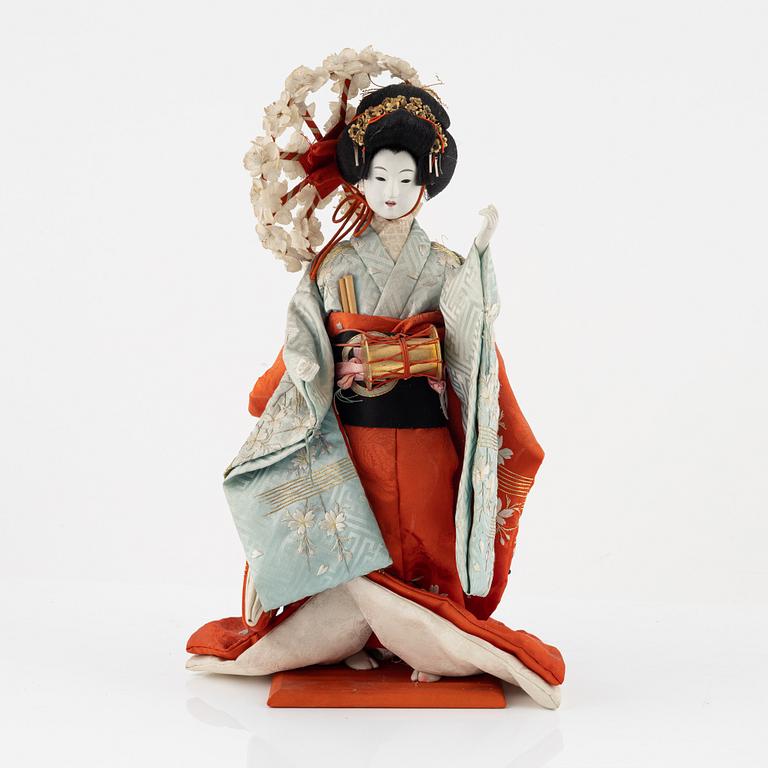 A Japanese doll, early 20th Century.