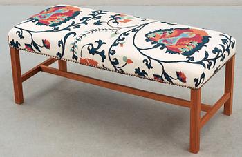 A Josef Frank cherry wood bench, Svenskt Tenn, model 2082.