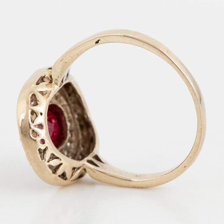 Ruby and diamond gold cluster ring.