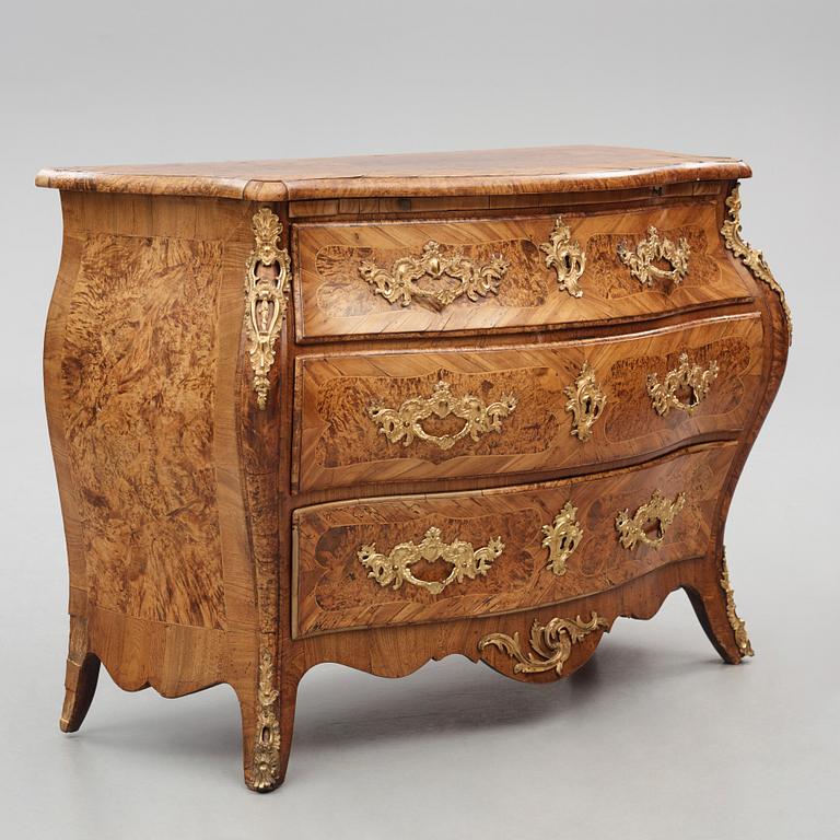 A burr-alder and gilt brass-mounted rococo commode by J. Sjölin (master 1767-1785).