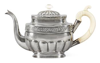 523. A Russian silver tea-pot, marks by Johan Kollsell, S:t Petersburg 1830.