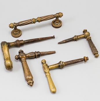 FIVE BRASS DOOR HANDLES, 19th century.