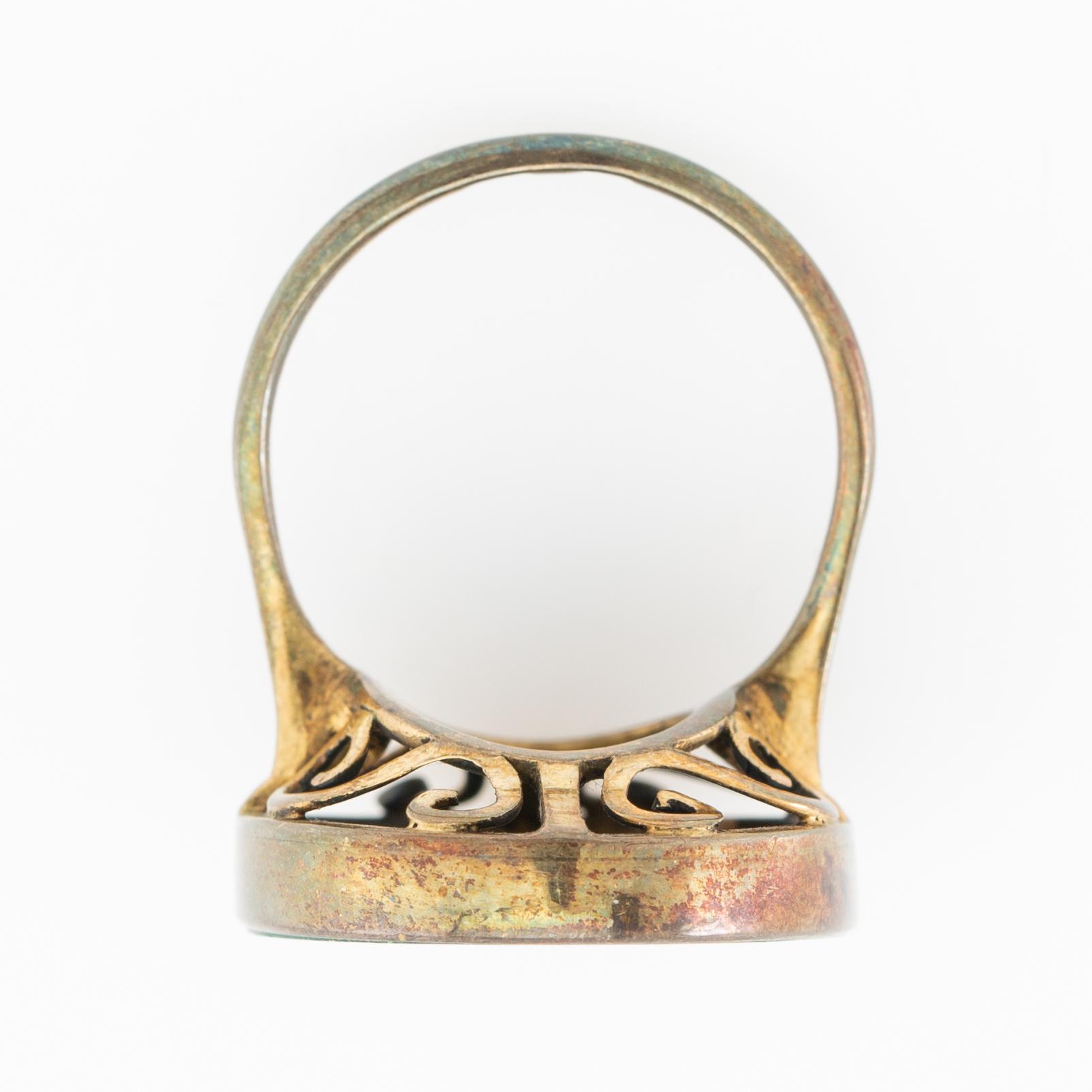 Halsband, ring och armband med slipade malakiter, Kina 1900-talets första hälft.