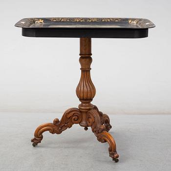 A mid 19th century empire folding table.