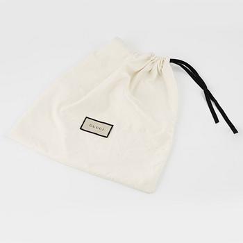 Gucci, a  'Matelassé Python GG Marmont'Shoulder Bag.