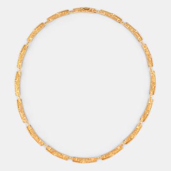 1084. A Björn Weckström necklace in 18K gold.