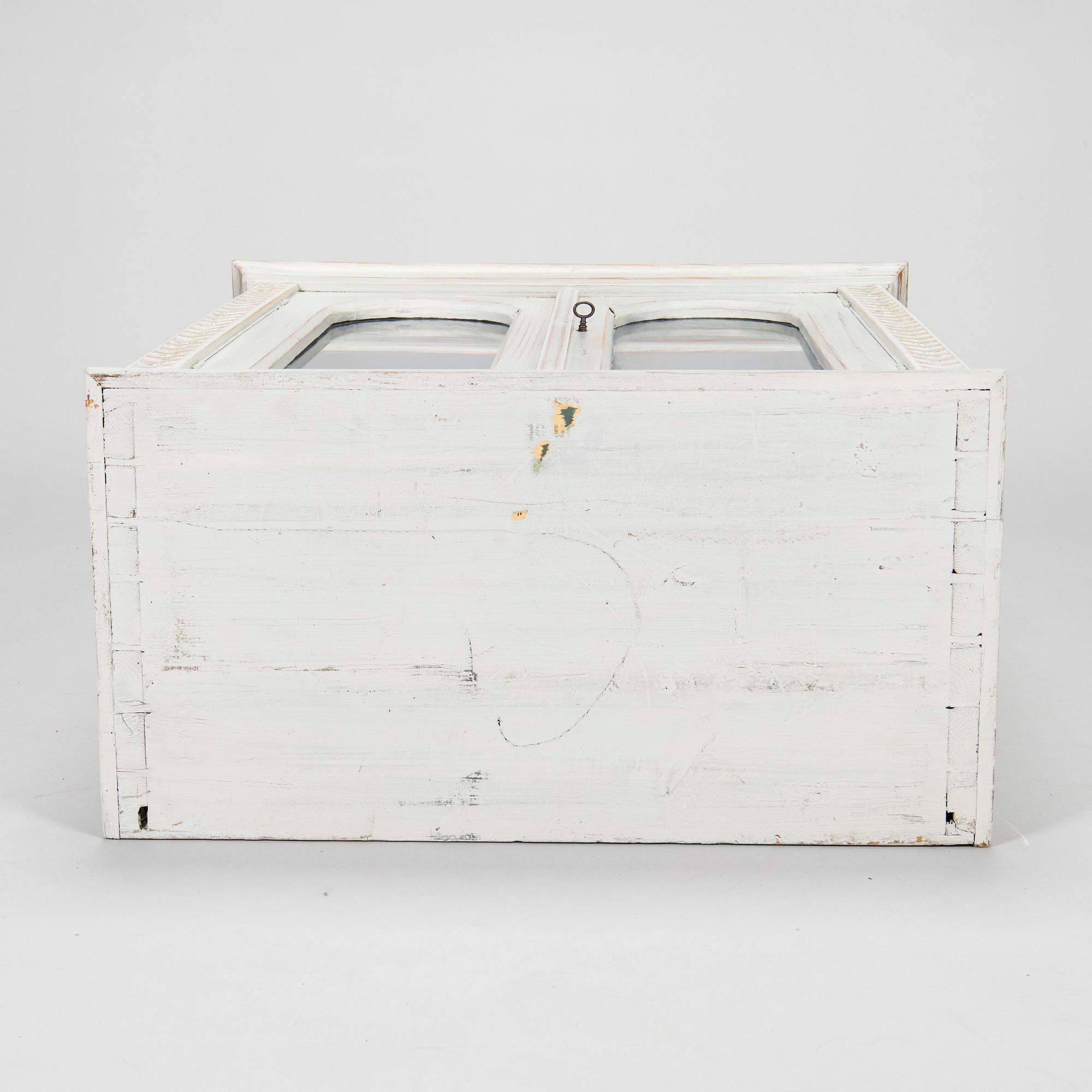 A late 19th-century wooden wall cabinet.