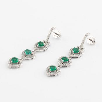 Emerald and brilliant cut diamond earrings.