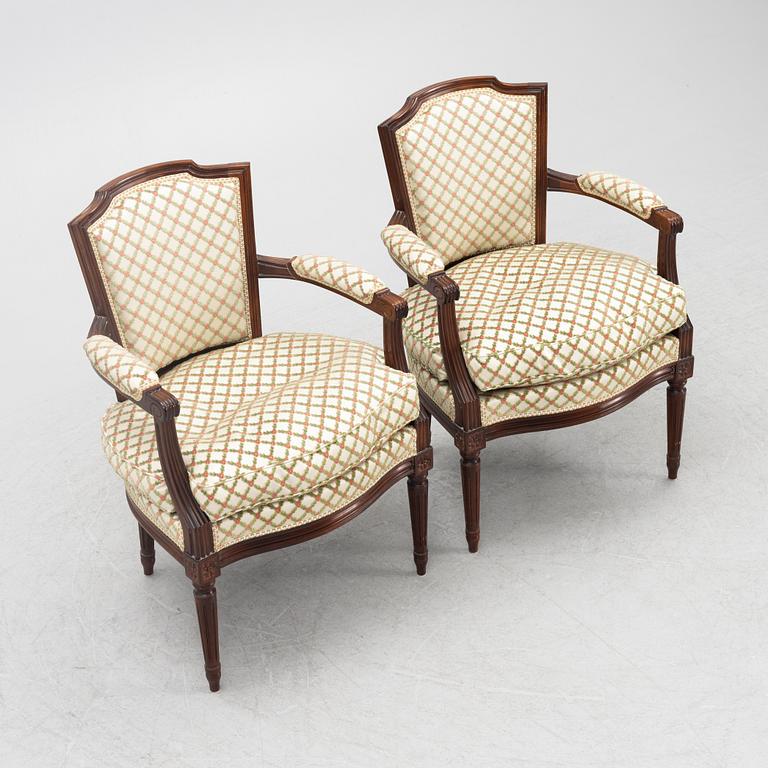 A Pair of Louis XVI Style Armchairs, 20th Century.