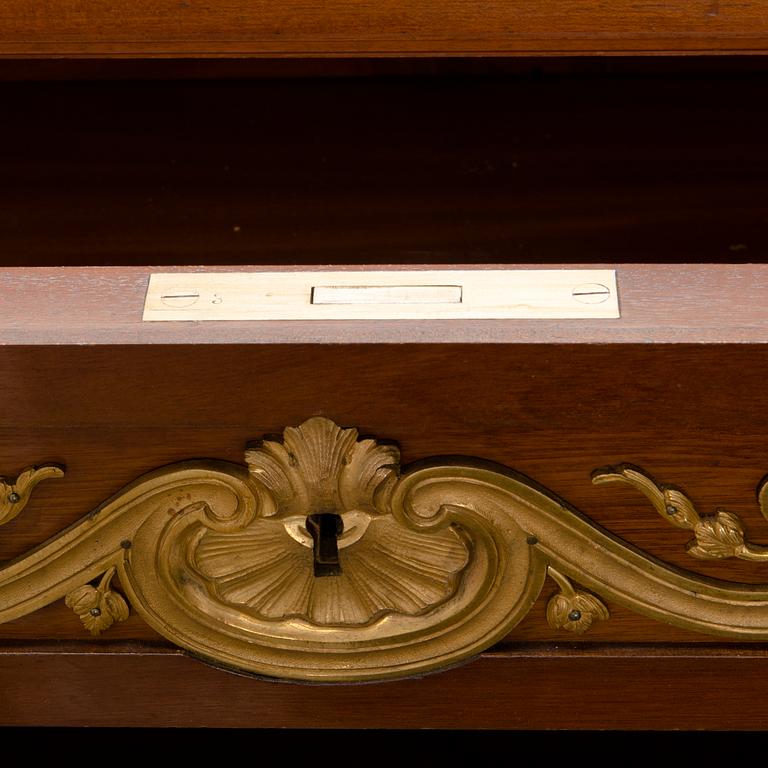 A 20th-century Louis XVI style bookcase.