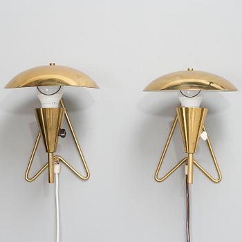 A pair of mid-20th-century wall lights / table lamps, model EV 57 for Itsu, Finland.