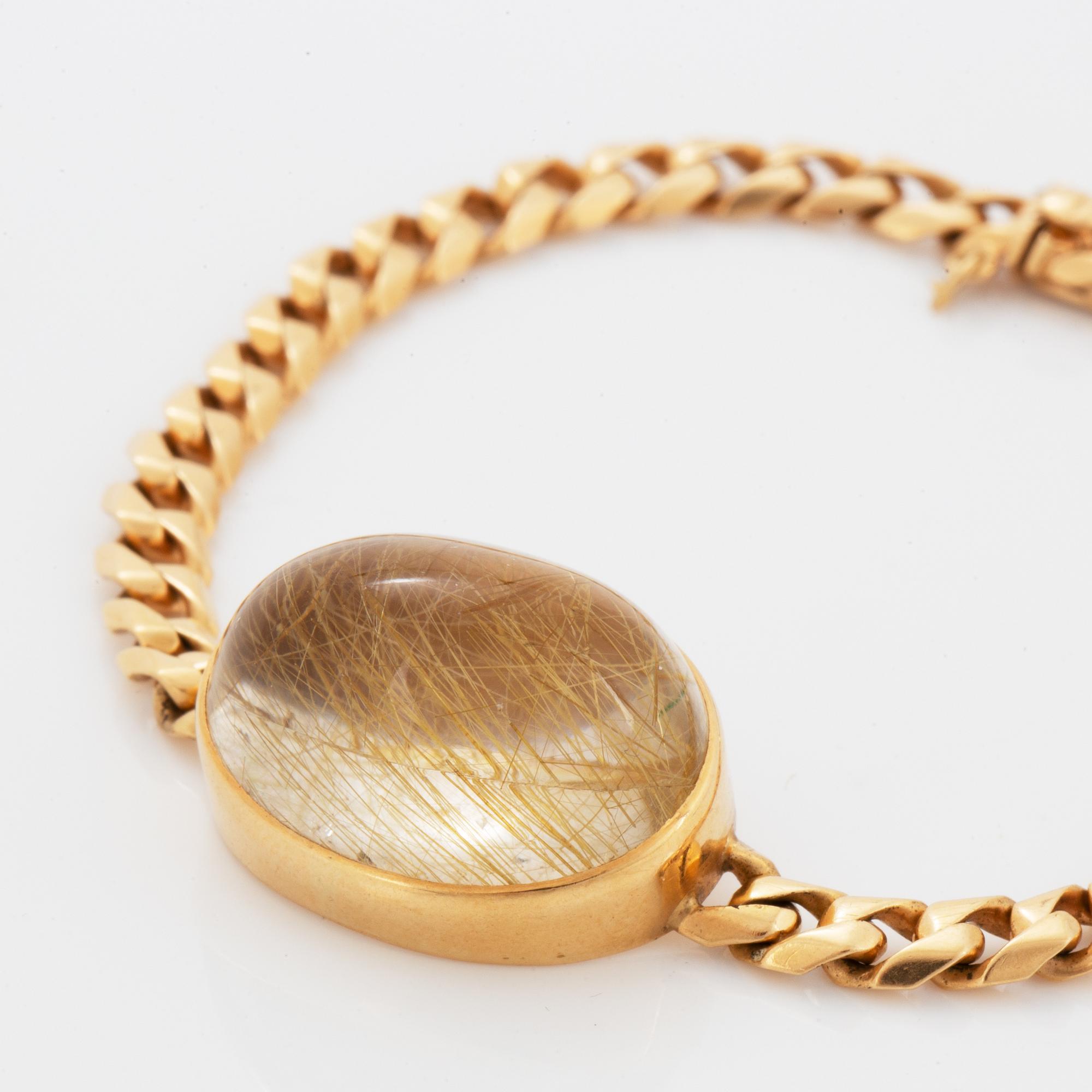 Cabochon-cut rutile quartz bracelet, 18K gold.