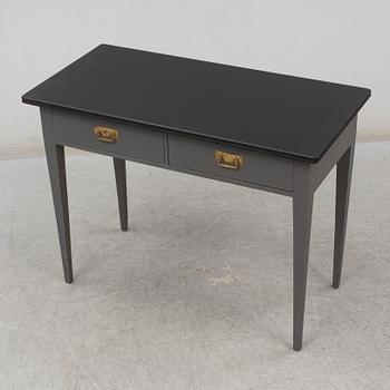 a writing desk from the first half of the 20th century.