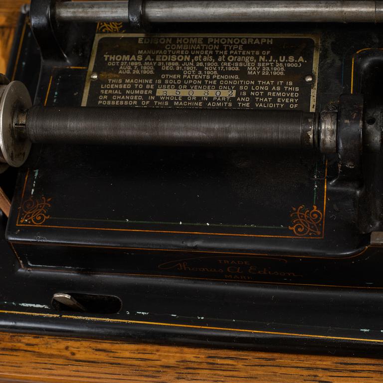 An Edison Phonograph with Cygnet horn and 12 cylinders.